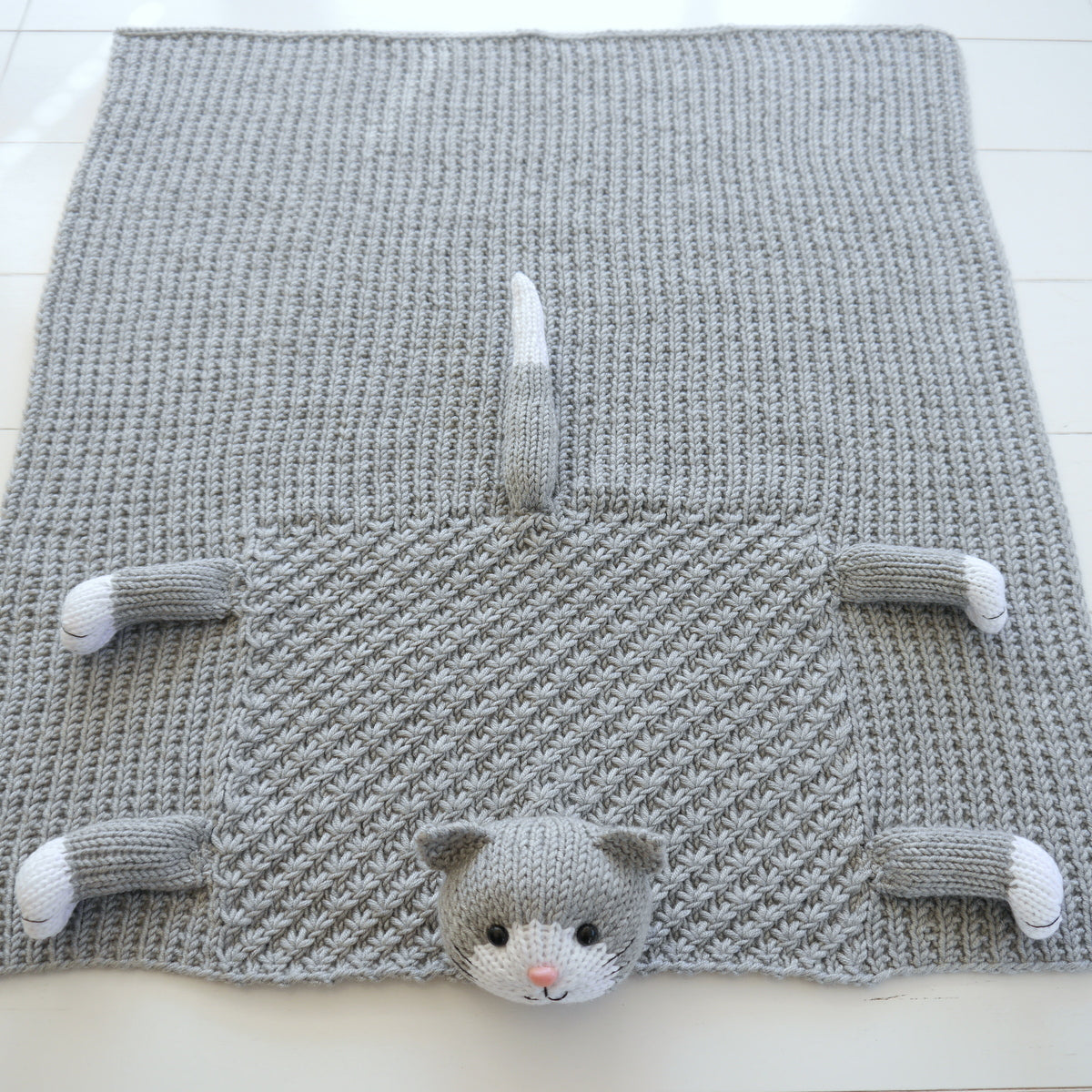 252 Strickanleitung Decke MIEZI
